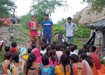 Akash Halder speaks to a group of kids in West Bengal