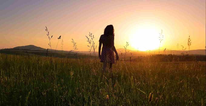 Girl in Field Sunset