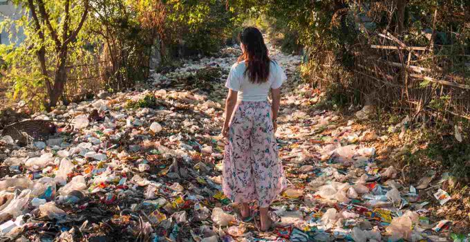 Woman at garbage dump