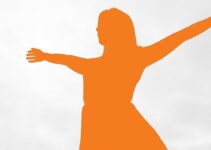 Silhouette of girl with outstretched hands.