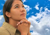 Girl Praying in Clouds