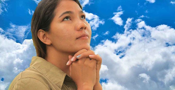 Girl Praying in Clouds