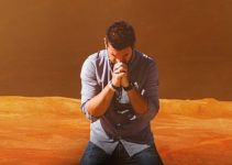 A young man earnestly praying