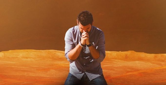 A young man earnestly praying